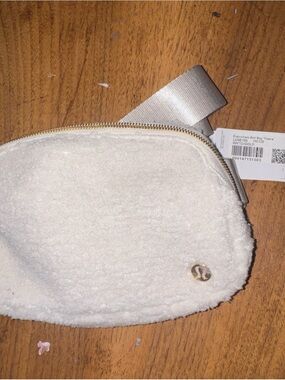 lululemon athletica White Fleece Belt Bag with Gold Hardware